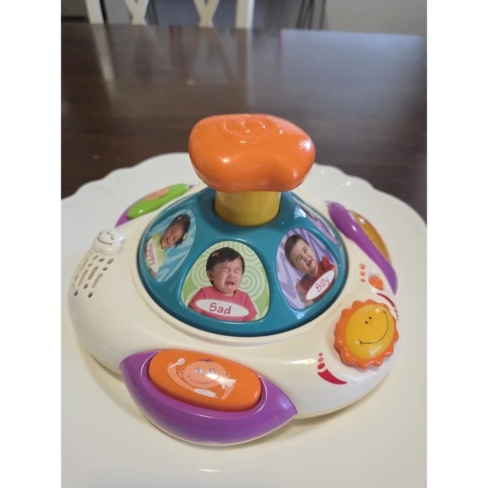 VTech Baby BrainyWorks Right Brain Baby Face spin toy